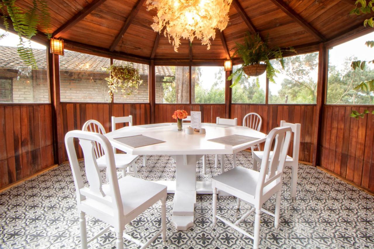 Hosteria Papagayo Cotopaxi Machachi Buitenkant foto